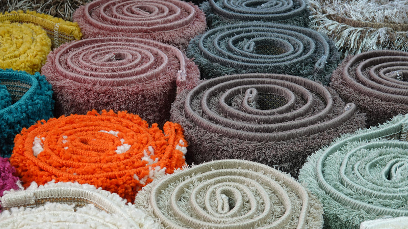 DECORATING WITH COLORFUL RUGS