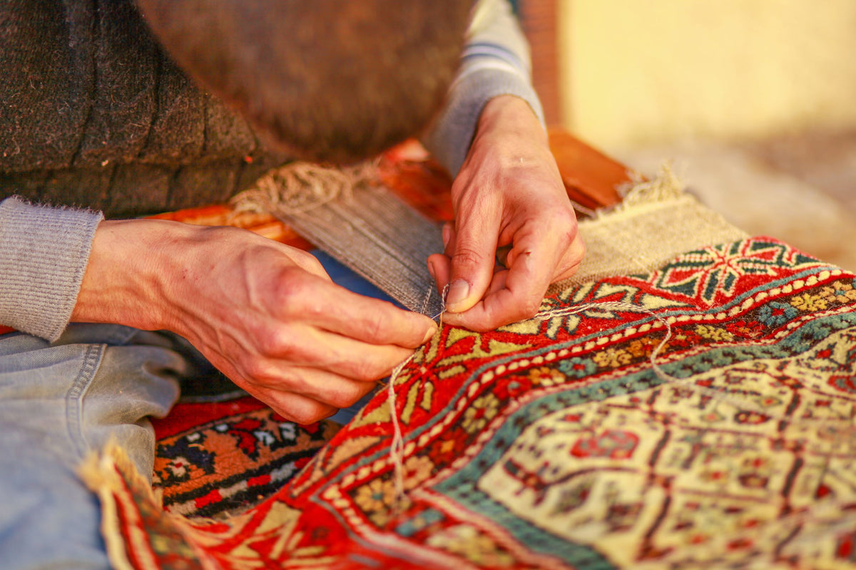 WHY ARE HANDMADE RUGS EXPENSIVE AND HOW THEY INCREASE IN VALUE