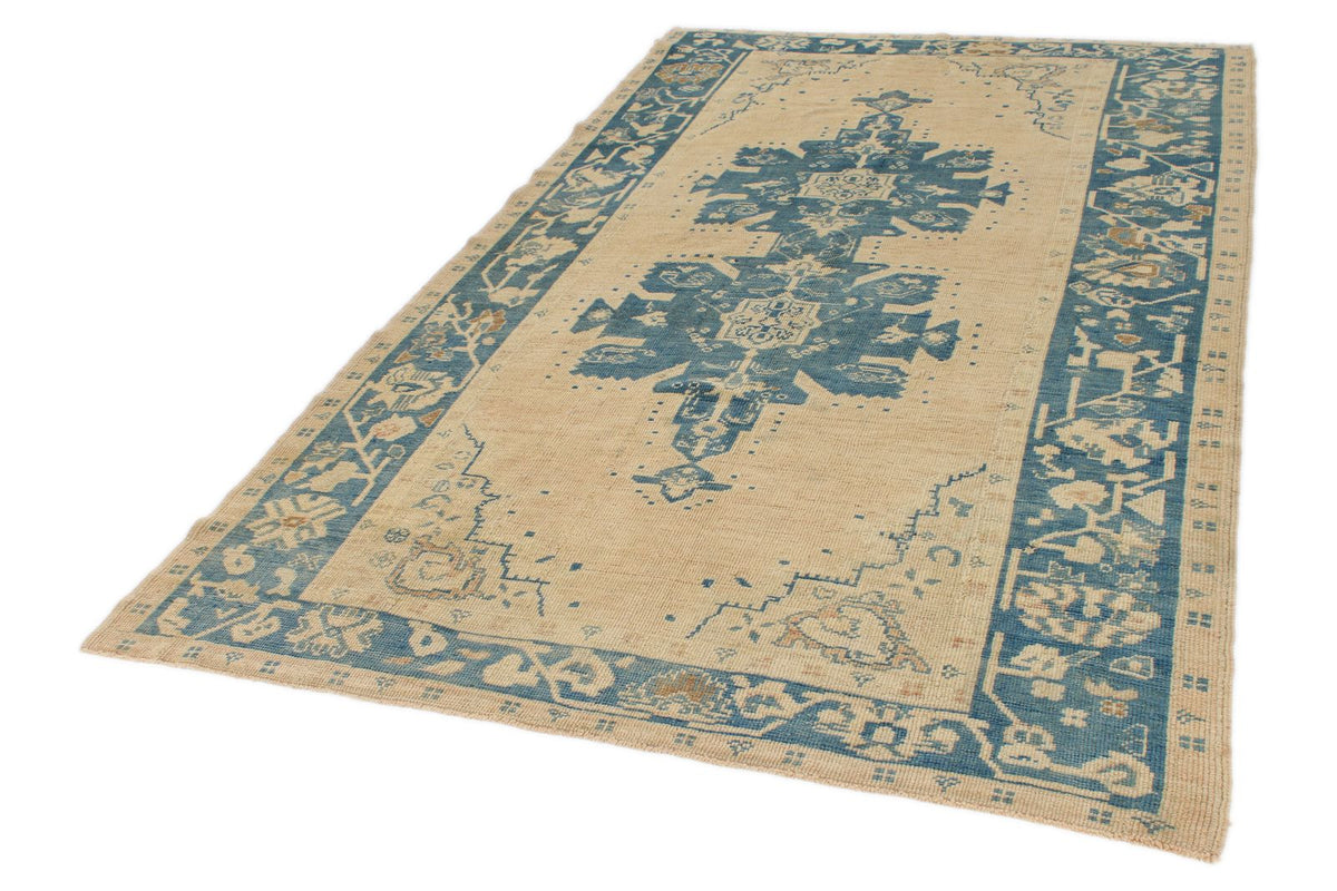6x10 Blue and Ivory Turkish Tribal Rug