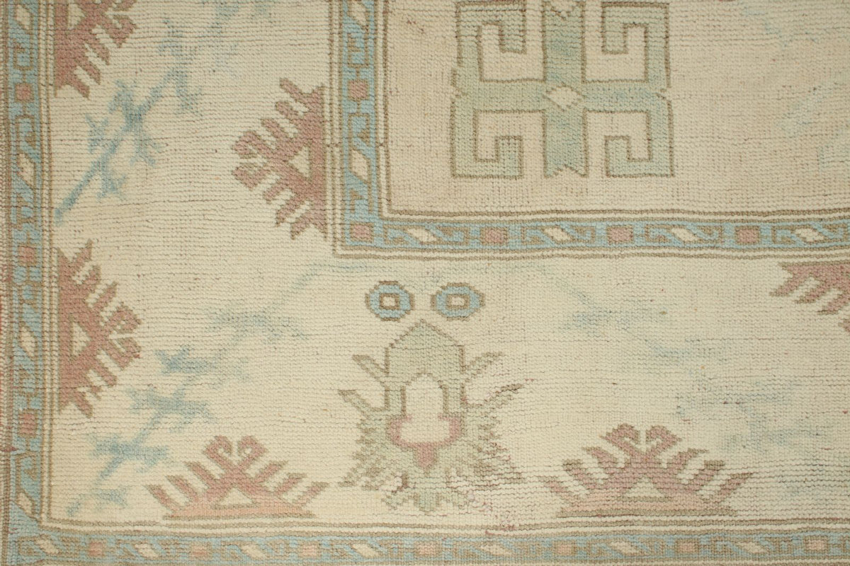 5x9 Blue and Ivory Turkish Tribal Rug