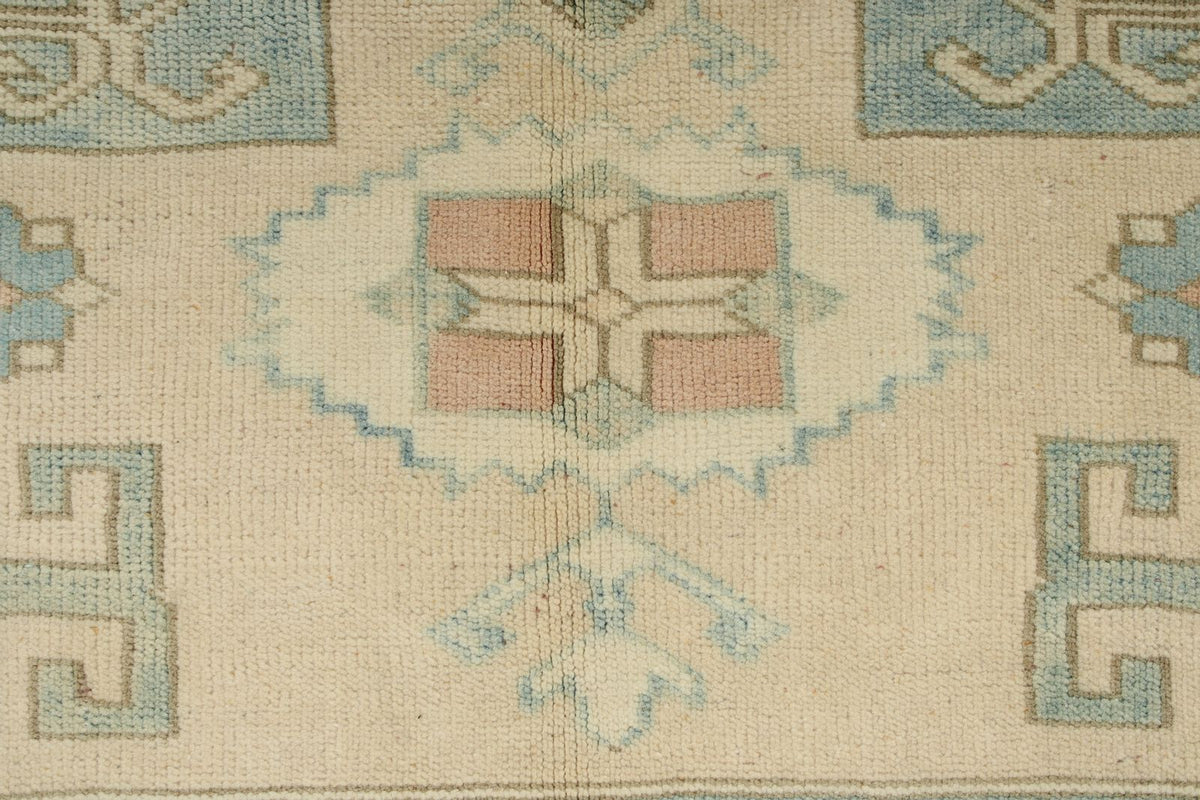 5x9 Blue and Ivory Turkish Tribal Rug