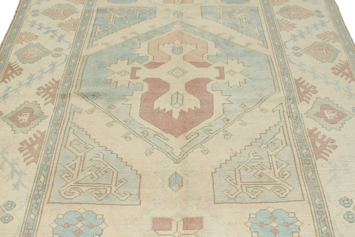 5x9 Blue and Ivory Turkish Tribal Rug