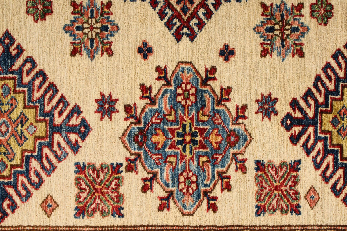 5x7 Ivory and Red Kazak Tribal Rug