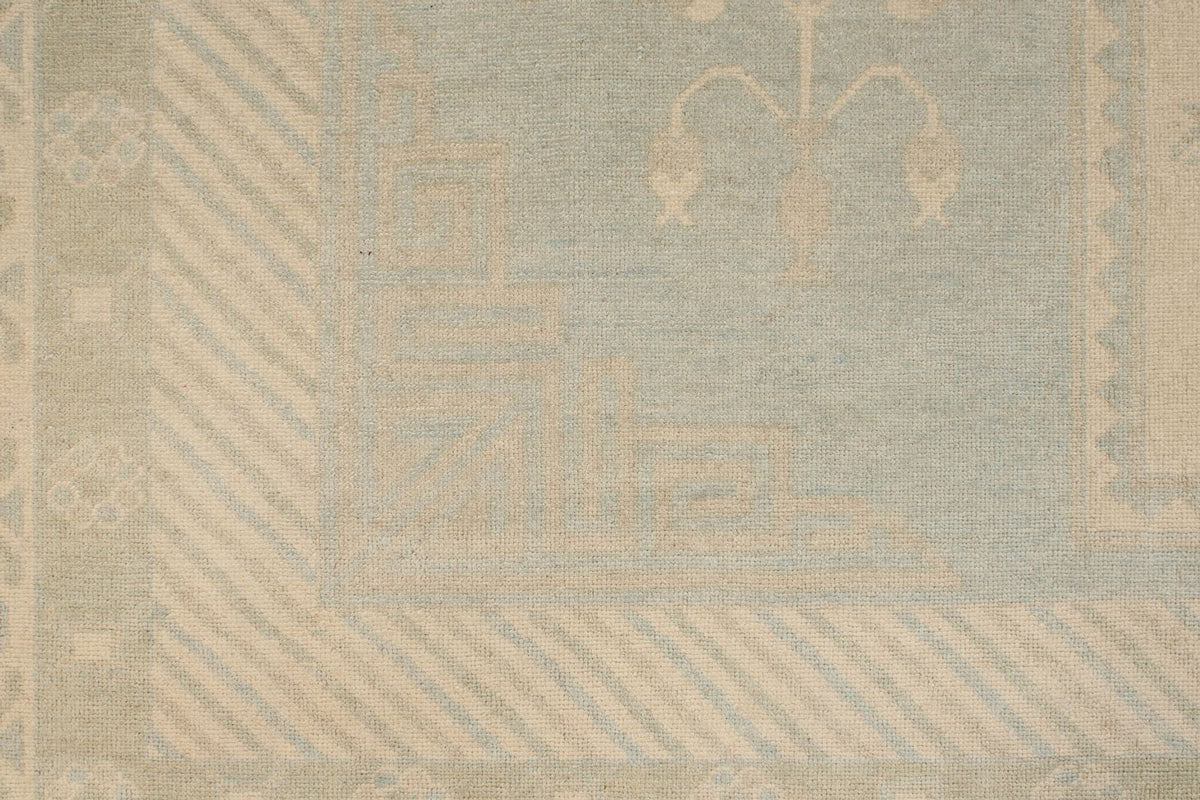 9x12 Light Blue and Ivory Turkish Tribal Rug