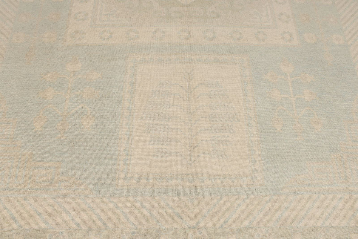 9x12 Light Blue and Ivory Turkish Tribal Rug