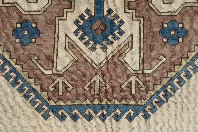 8x12 Ivory and Blue Turkish Tribal Rug