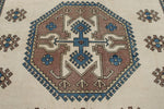 8x12 Ivory and Blue Turkish Tribal Rug