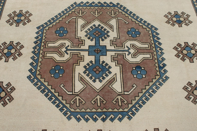 8x12 Ivory and Blue Turkish Tribal Rug