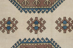 8x12 Ivory and Blue Turkish Tribal Rug