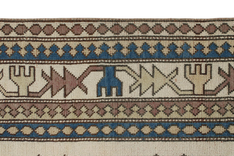 8x12 Ivory and Blue Turkish Tribal Rug