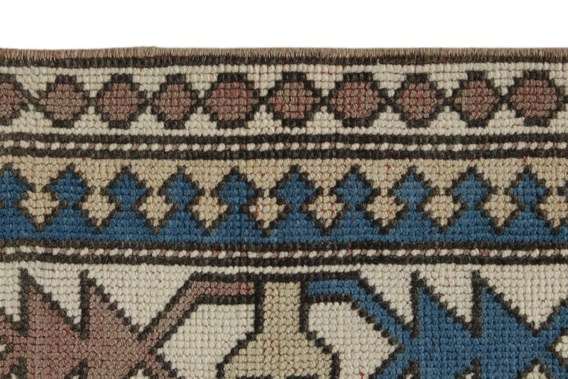 8x12 Ivory and Blue Turkish Tribal Rug