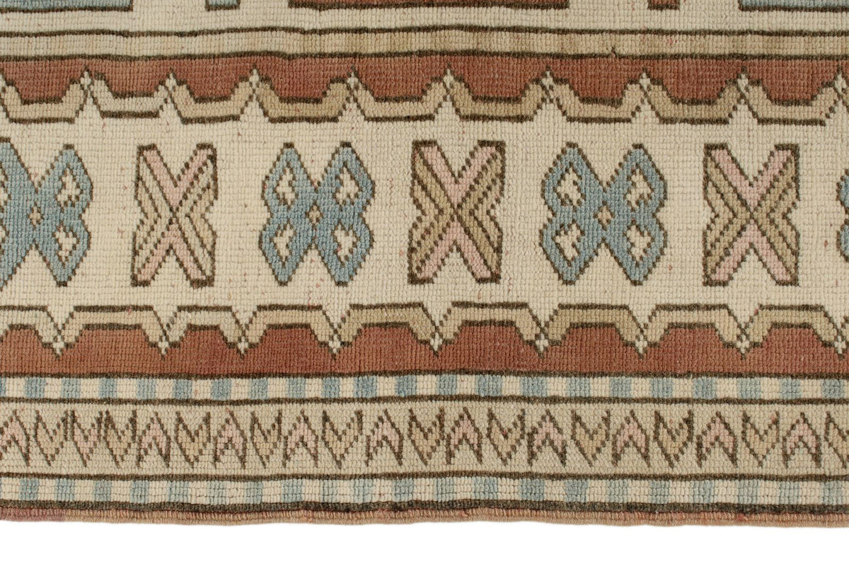 9x11 Pink and Ivory Turkish Tribal Rug