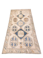 4x7 Ivory and Blue Turkish Tribal Rug