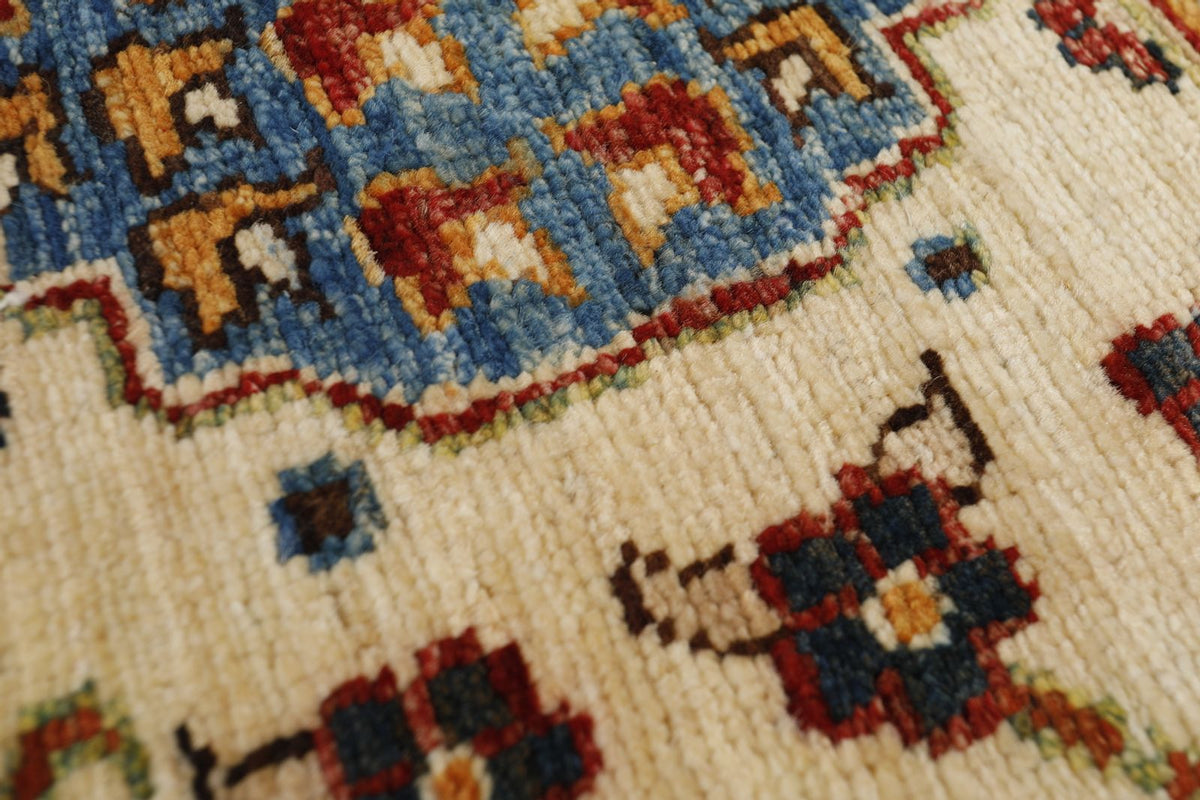 8x10 Light Blue and Ivory Turkish Tribal Rug