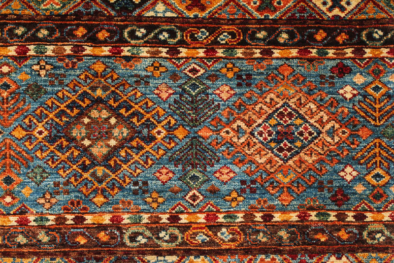 5x7 Red and Multicolor Tribal Rug