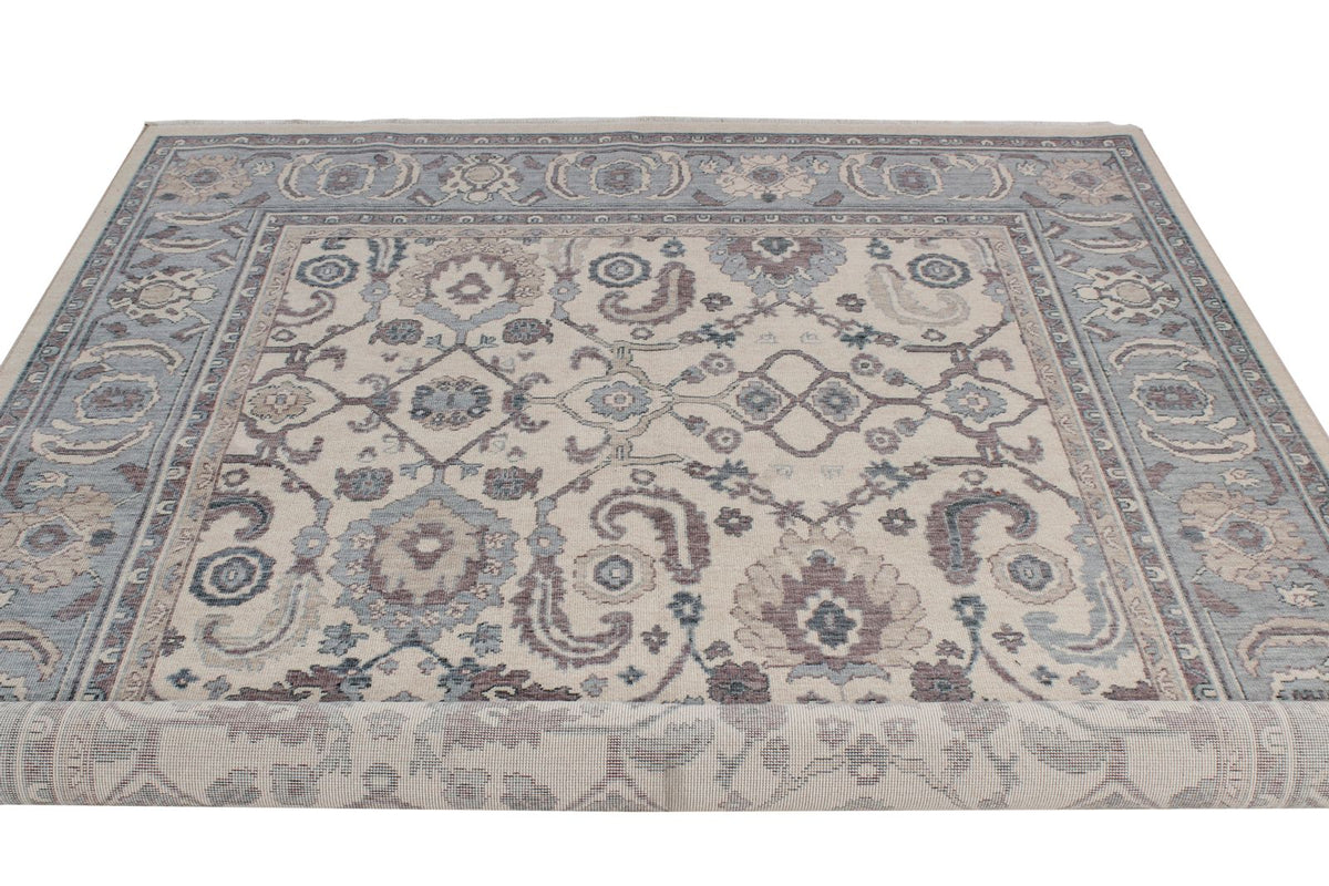 6x10 Ivory and Blue Turkish Traditional Rug