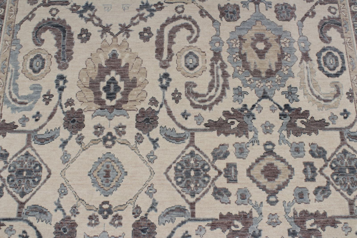 6x10 Ivory and Blue Turkish Traditional Rug