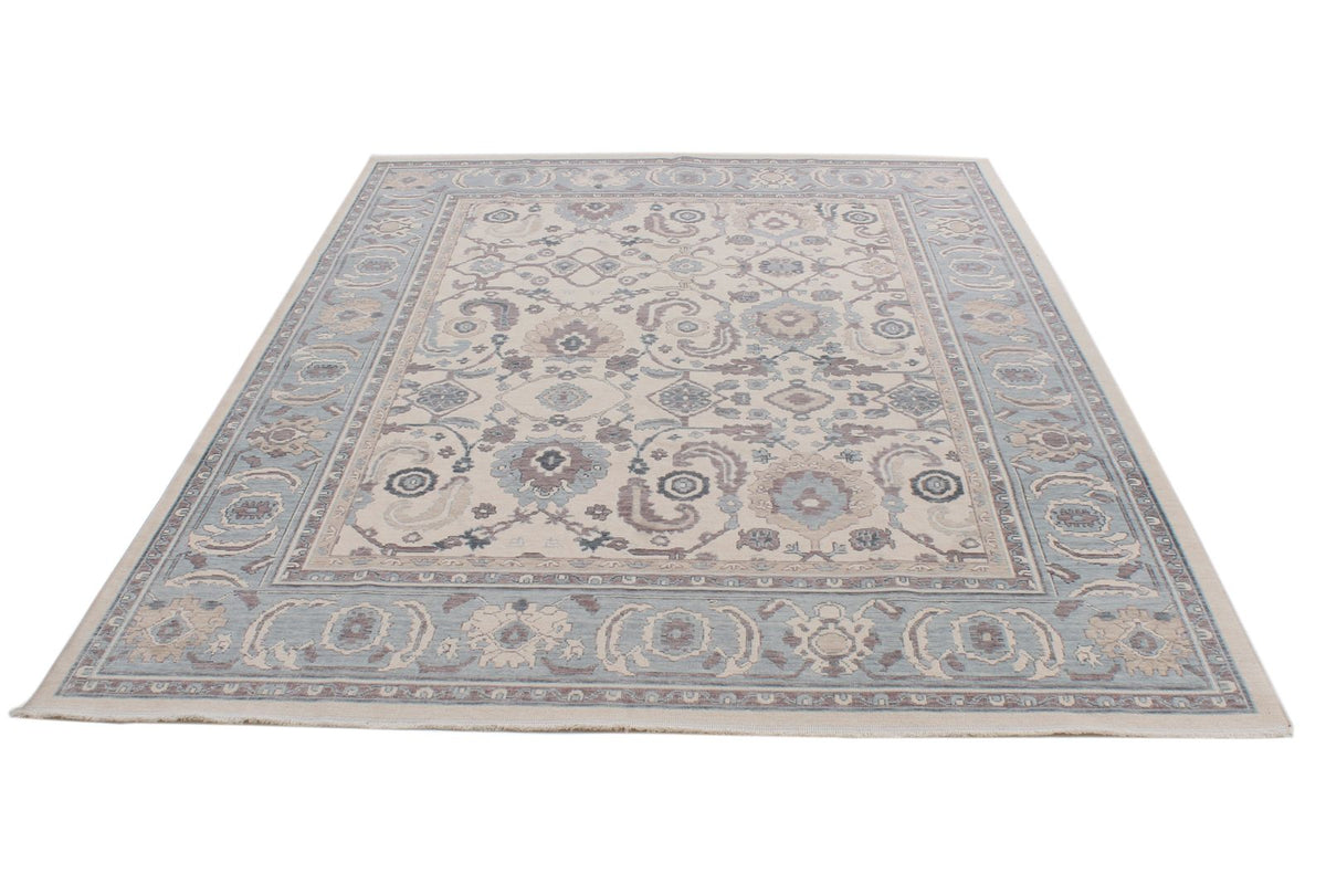 6x10 Ivory and Blue Turkish Traditional Rug