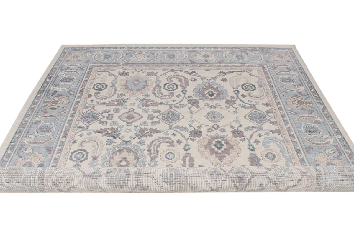 6x10 Ivory and Blue Turkish Traditional Rug