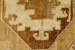 9x12 Ivory and Brown Turkish Tribal Rug