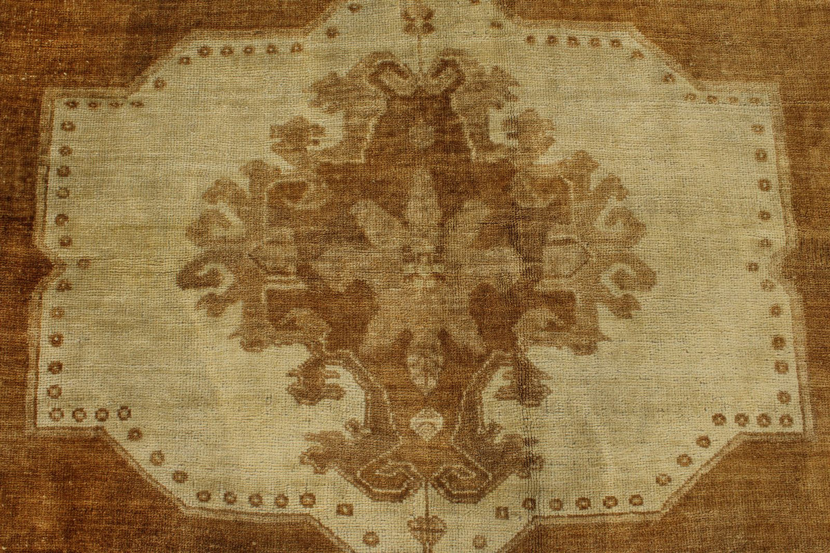 6x10 Ivory and Brown Turkish Tribal Rug
