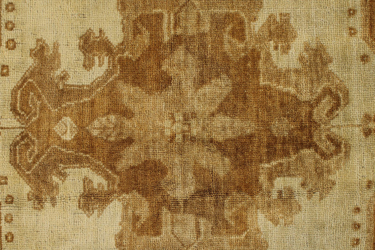 6x10 Ivory and Brown Turkish Tribal Rug