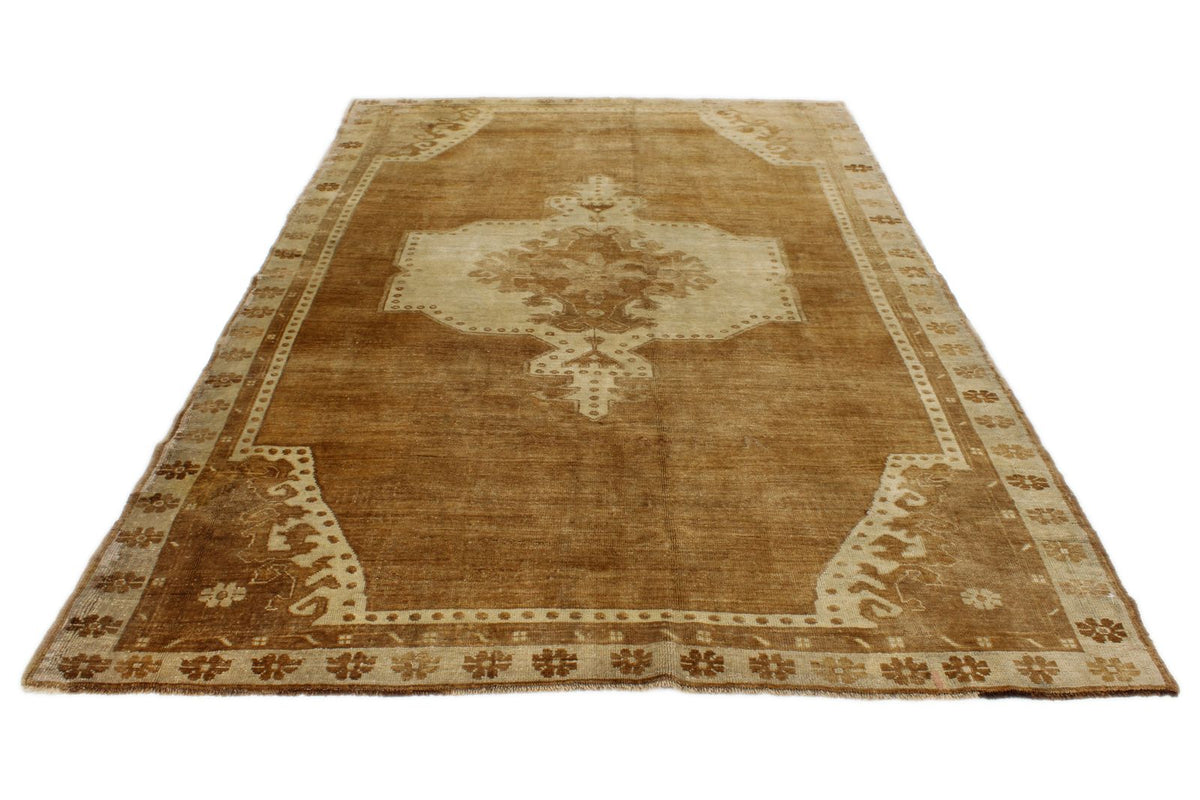 6x10 Ivory and Brown Turkish Tribal Rug