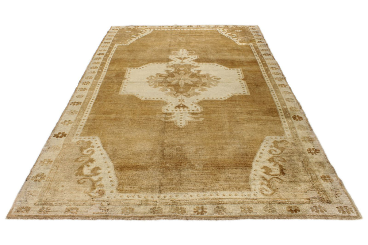 6x10 Ivory and Brown Turkish Tribal Rug