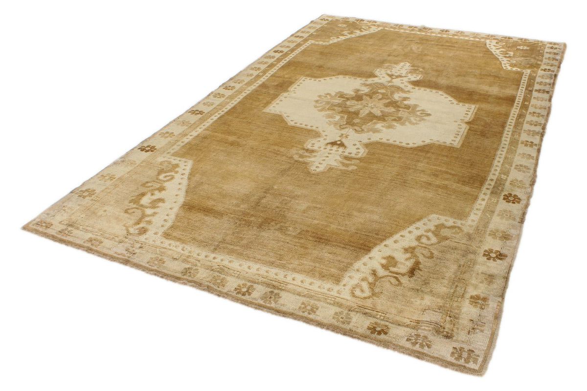 6x10 Ivory and Brown Turkish Tribal Rug