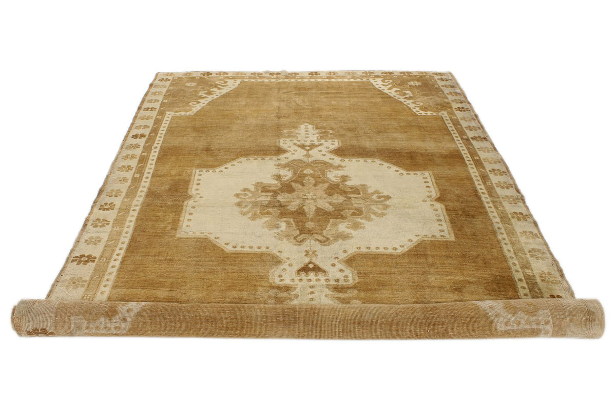 6x10 Ivory and Brown Turkish Tribal Rug
