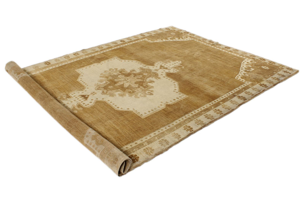 6x10 Ivory and Brown Turkish Tribal Rug