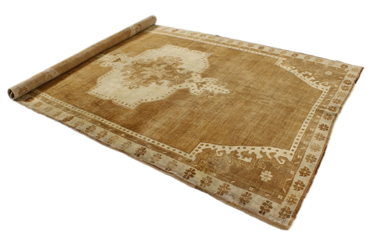 6x10 Ivory and Brown Turkish Tribal Rug