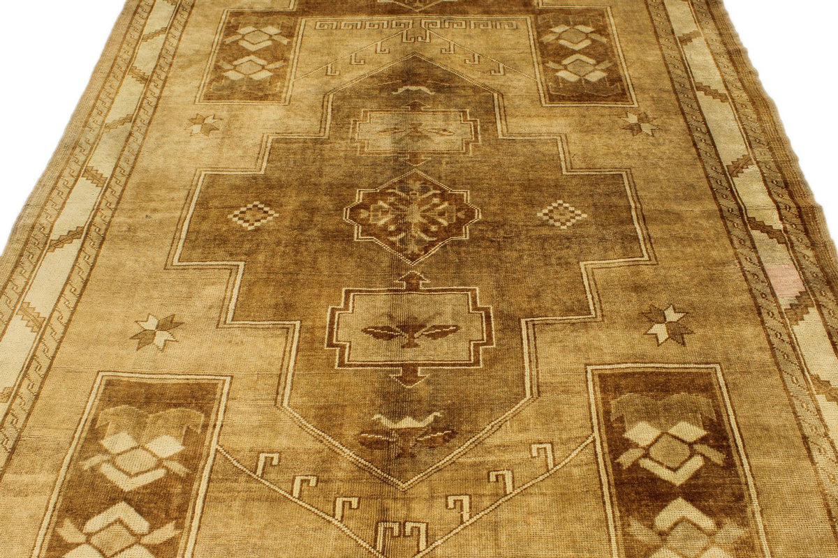 6x10 Ivory and Brown Turkish Tribal Rug