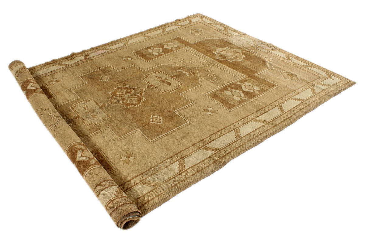 6x10 Ivory and Brown Turkish Tribal Rug