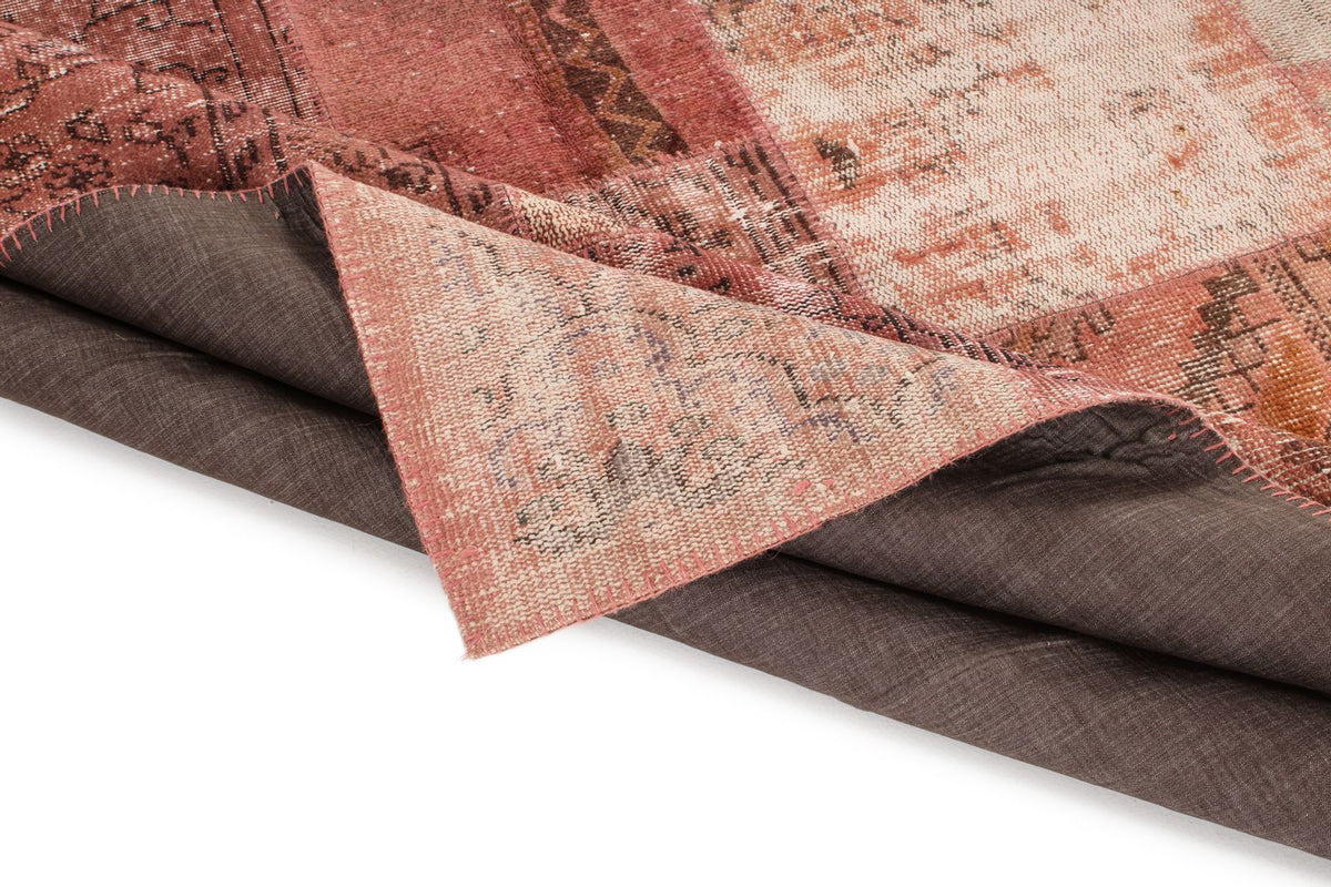 7x10 Rust and Pink Turkish Patchwork Rug