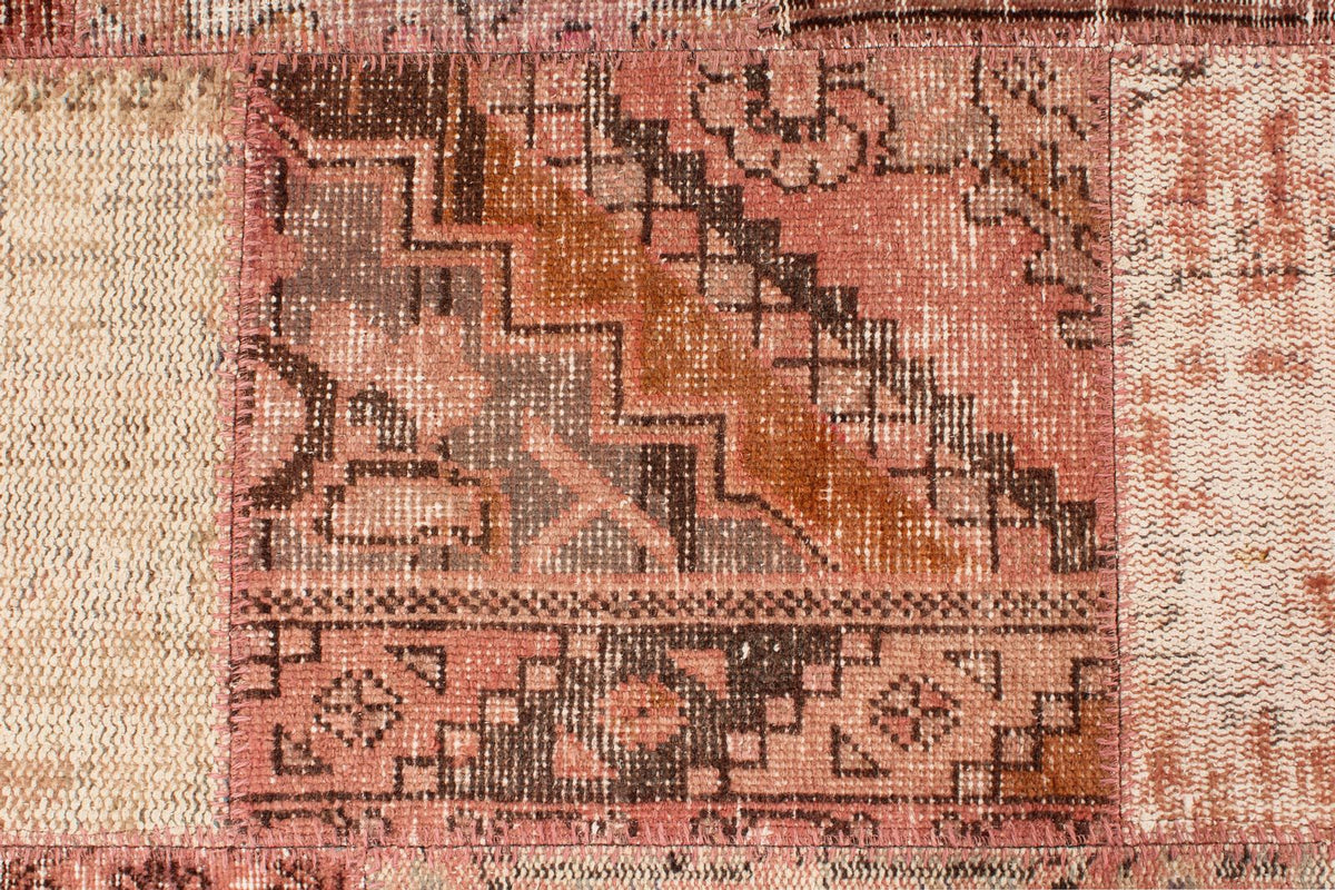 7x10 Rust and Pink Turkish Patchwork Rug