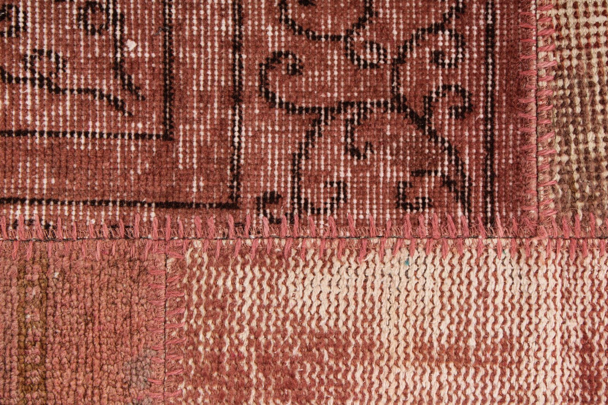 7x10 Rust and Pink Turkish Patchwork Rug
