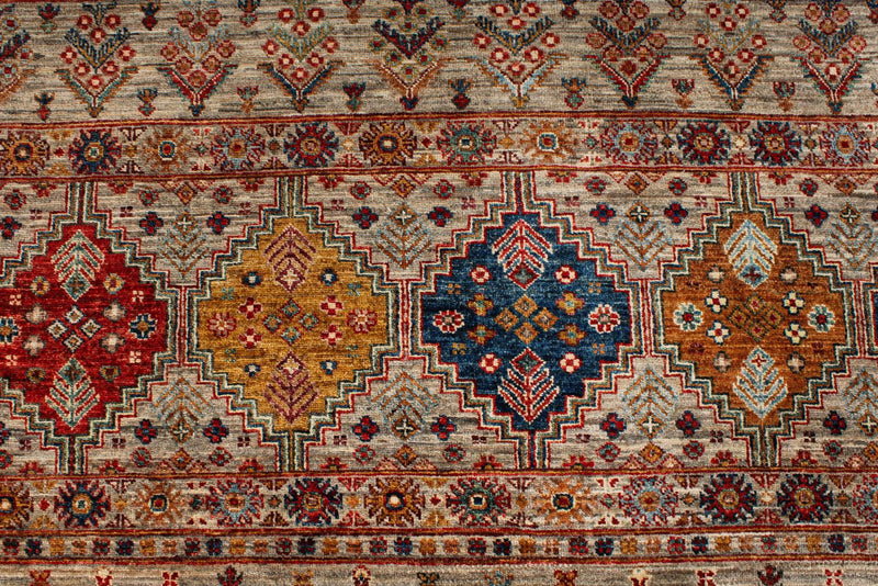 7x10 Light Brown and Multicolor Tribal Rug