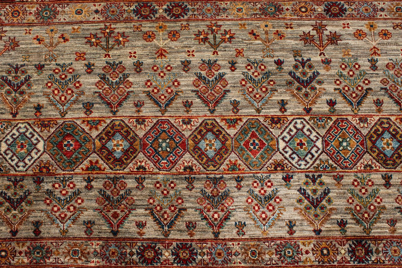 7x10 Light Brown and Multicolor Tribal Rug