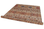 7x10 Light Brown and Multicolor Tribal Rug