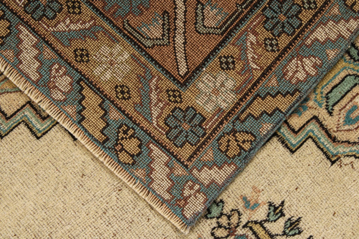 7x10 Ivory and Multicolor Turkish Overdyed Rug