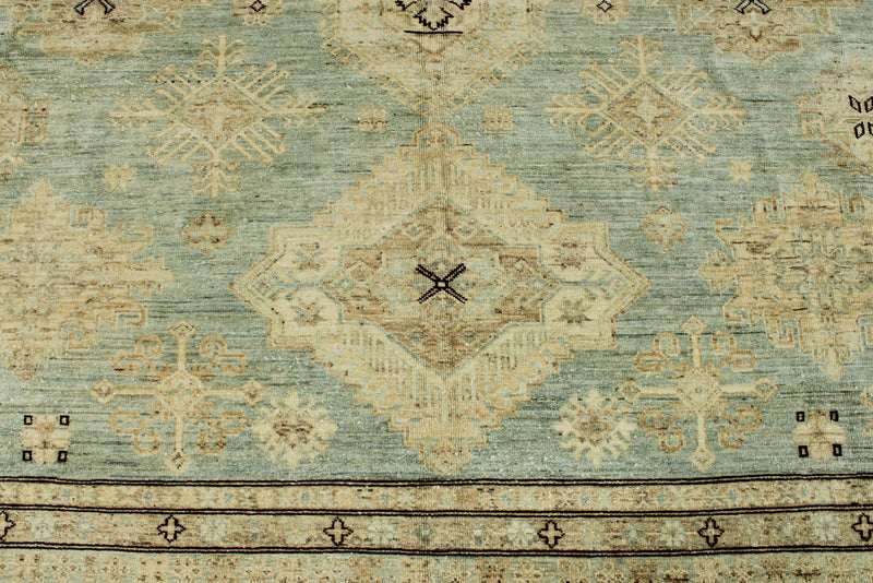 9x12 Light Blue and Ivory Turkish Tribal Rug