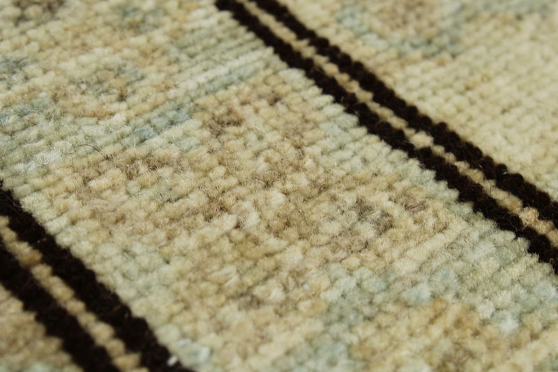 9x12 Light Blue and Ivory Turkish Tribal Rug