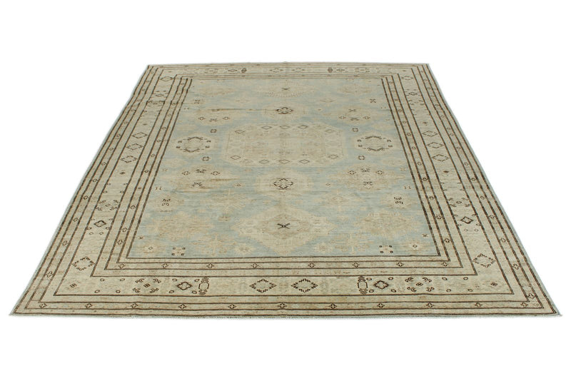 9x12 Light Blue and Ivory Turkish Tribal Rug