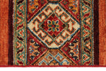 5x6 Brown and Multicolor Tribal Rug