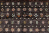 7x10 Brown and Multicolor Tribal Rug