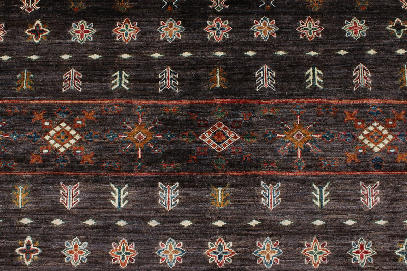 7x10 Brown and Multicolor Tribal Rug