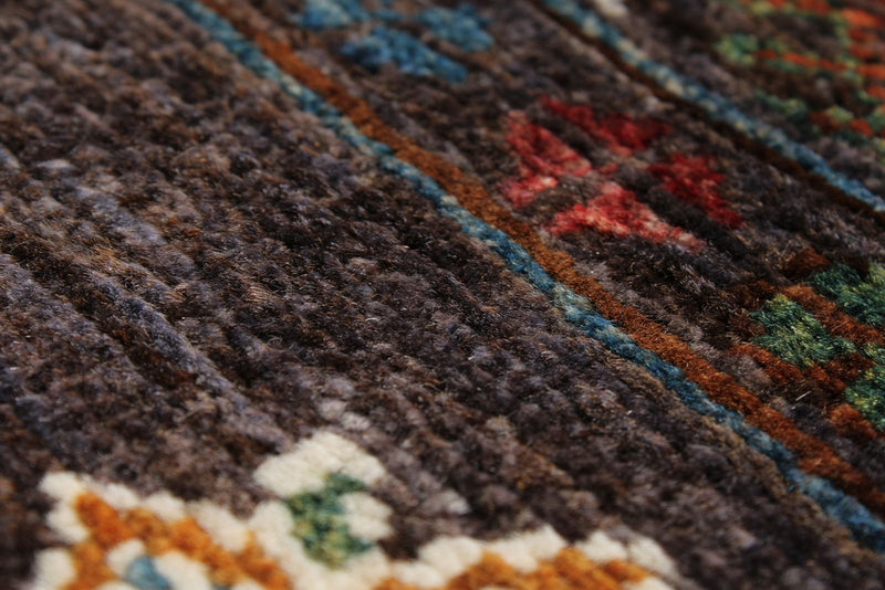 7x10 Brown and Multicolor Tribal Rug