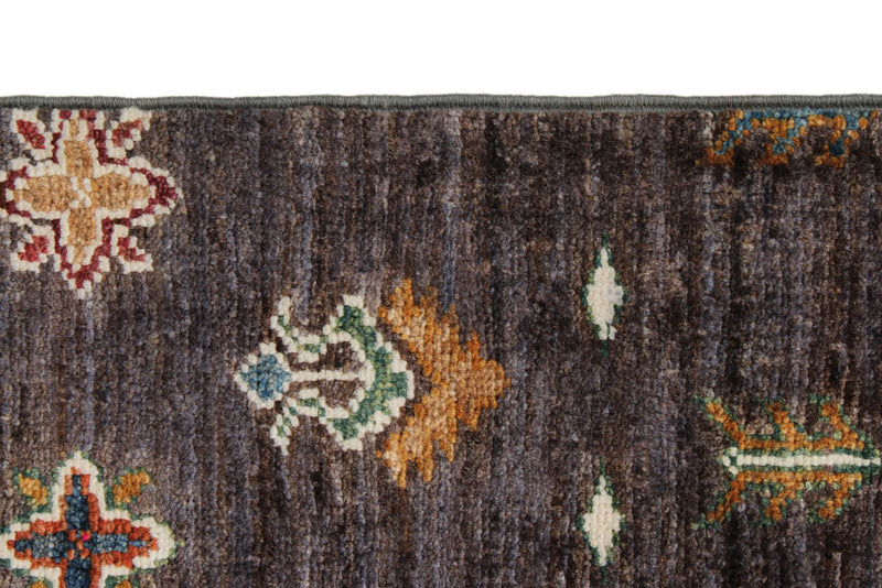 7x10 Brown and Multicolor Tribal Rug