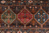 7x10 Brown and Multicolor Tribal Rug